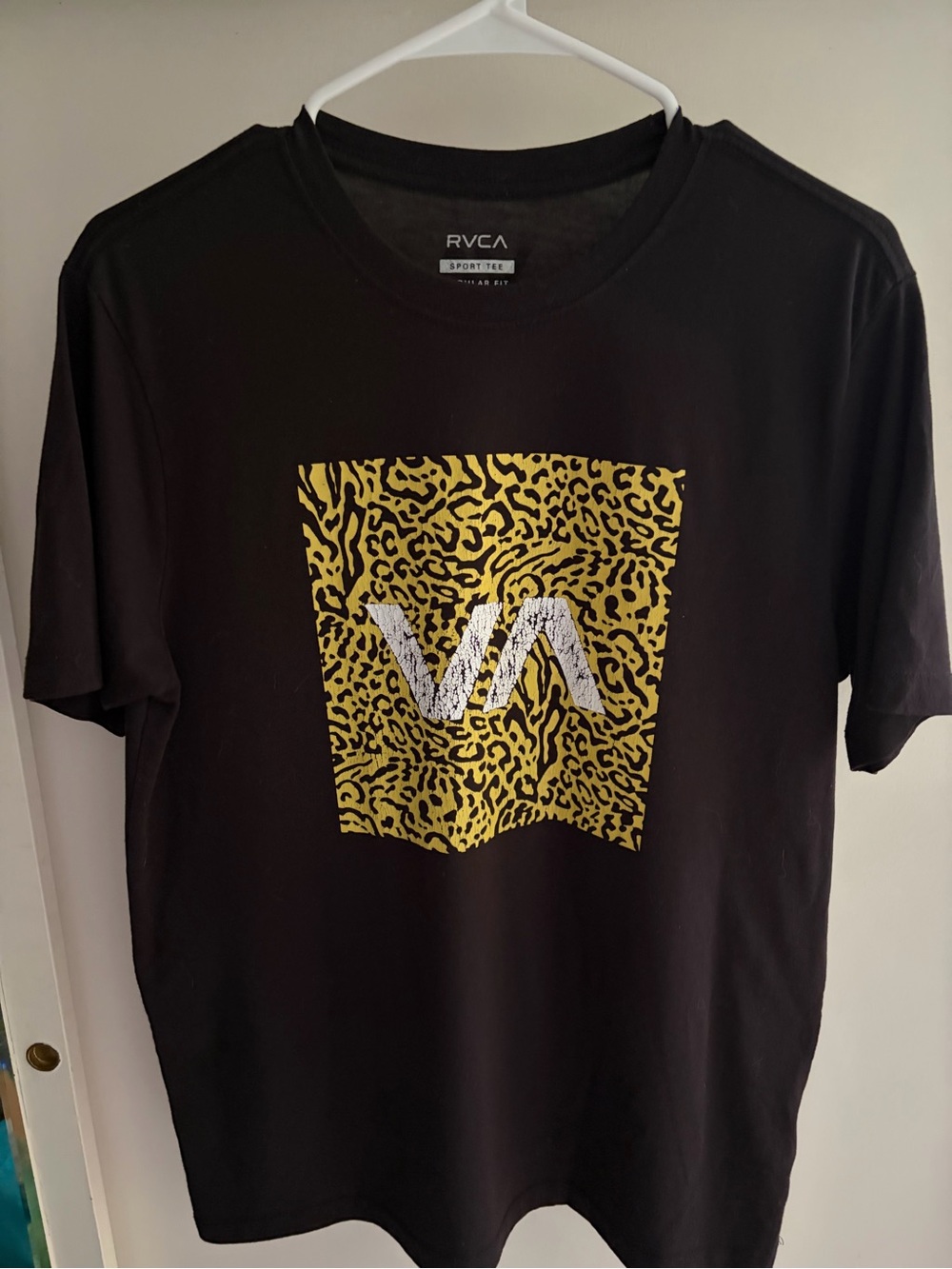 RVCA Black Short-Sleeve Tee with Yellow Leopard Box and White Logo